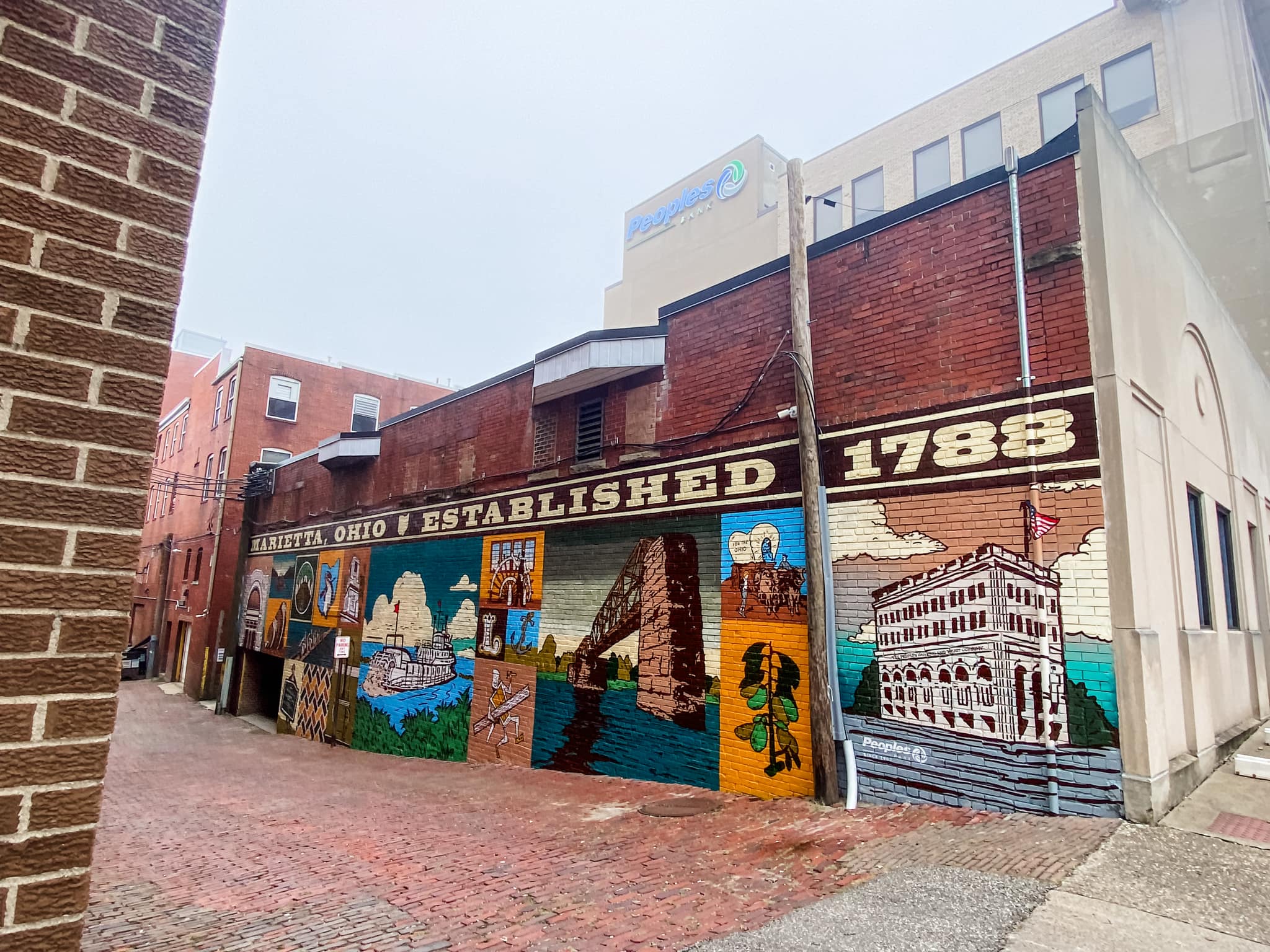 Peoples Bank mural at headquarters in Marietta celebrates the city's rich history.