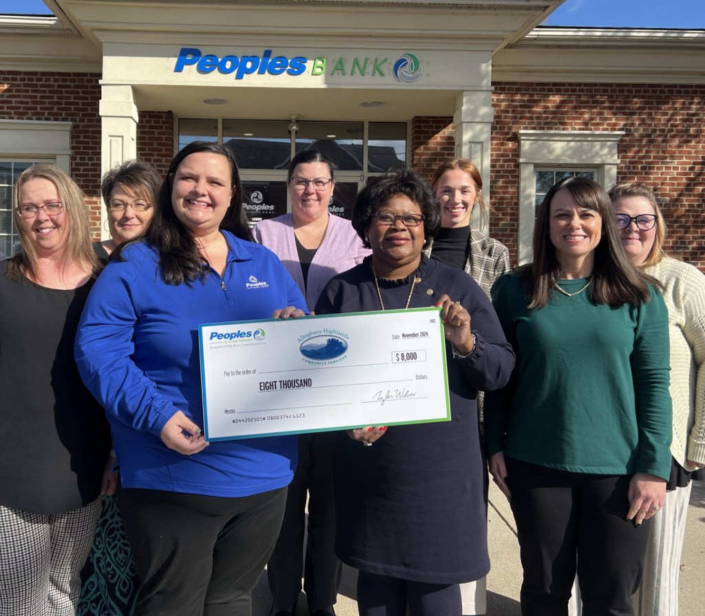 The Peoples Bank Foundation presents a $8,000 donation to a representative of the Allegheny Highlands Community Services.